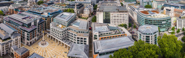 London aerial panorama over Stock Exchange Paternoster Square Finanacial district Aerial panorama over Paternoster Square and the London Stock Exchange in the heart of the City of London Square Mile financial district, UK. paternoster square stock pictures, royalty-free photos & images