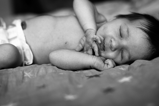Beautiful newborn girl sleeping