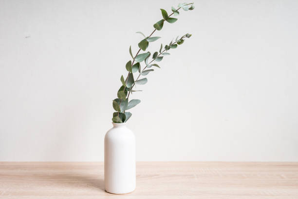 istock Minimalist home decor with empty frame mock-up on white wall background 1371075425