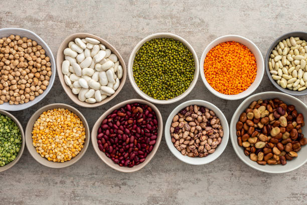istock Different types of legumes in bowls 1371075504