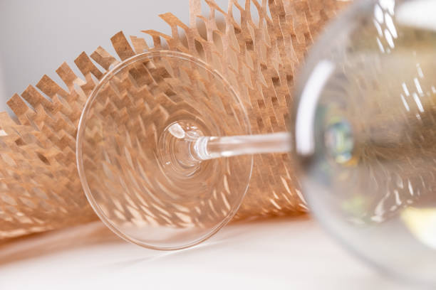 Fragile glassware in honeycomb packing paper.
