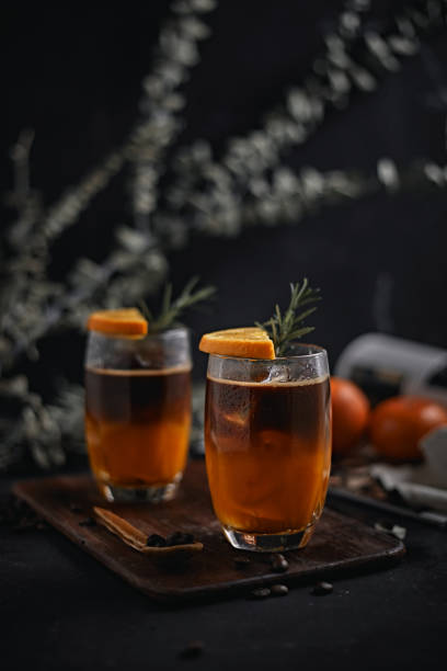 istock iced americano black coffee and layer of orange 1371077496