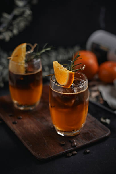 istock iced americano black coffee and layer of orange 1371077526