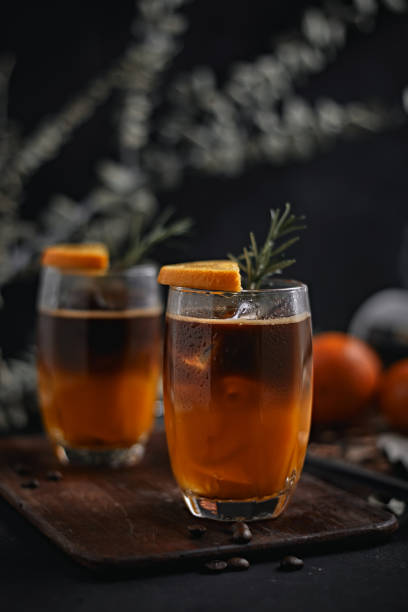 istock iced americano black coffee and layer of orange 1371077613