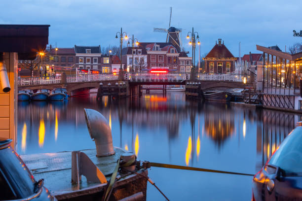 istock Leiden canal with Windmill De Valk 1371080815