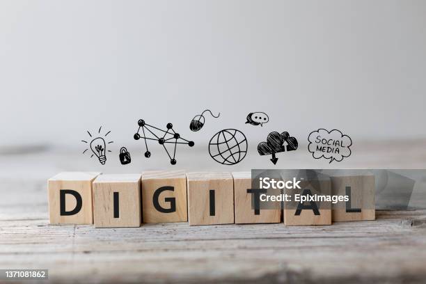Digital Wording On Wooden Cubes With Education Icons Stock Photo - Download Image Now
