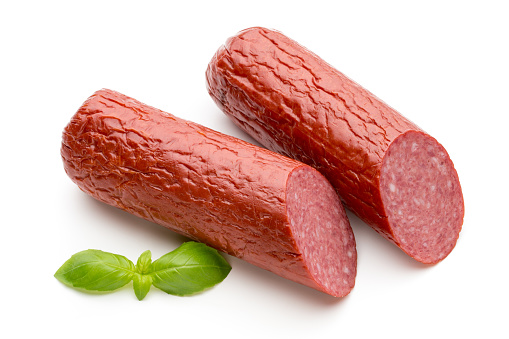 Slices of salami. Isolated on a white background. sausage cut.