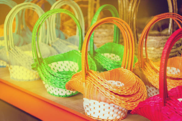 multi-colored wicker basket in a row for sale