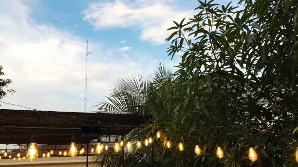 istock a chandelier that has started to light in a garden 1371090741