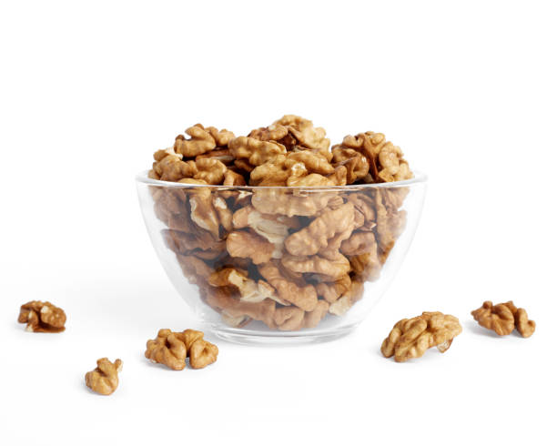 istock Peeled walnuts in a glass bowl 1371091898