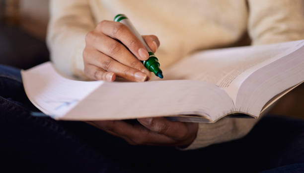 istock Cropped shot of a woman using a green marker while studying 1371091949