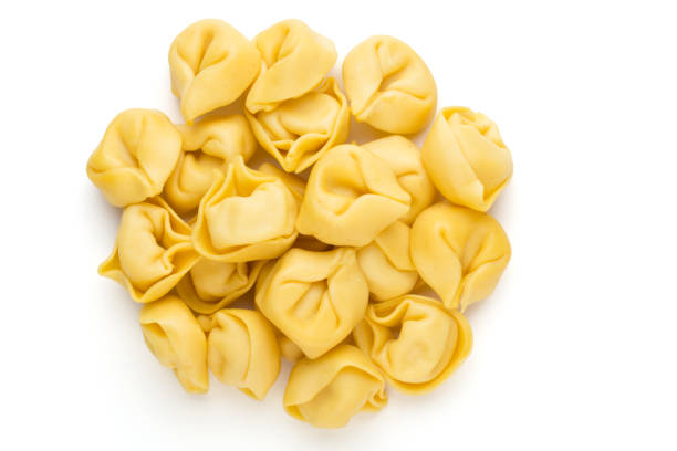 istock Raw homemade pasta,tortellini with herbs. 1371094237
