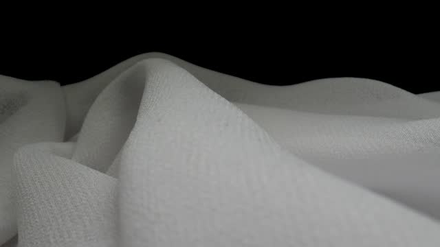 MACRO CAMERA MOVEMENT ON A WHITE CANVAS WITH A BLACK BACKGROUND