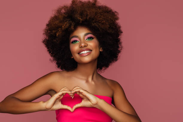 istock Beautiful afro woman with bright make-up 1371098985