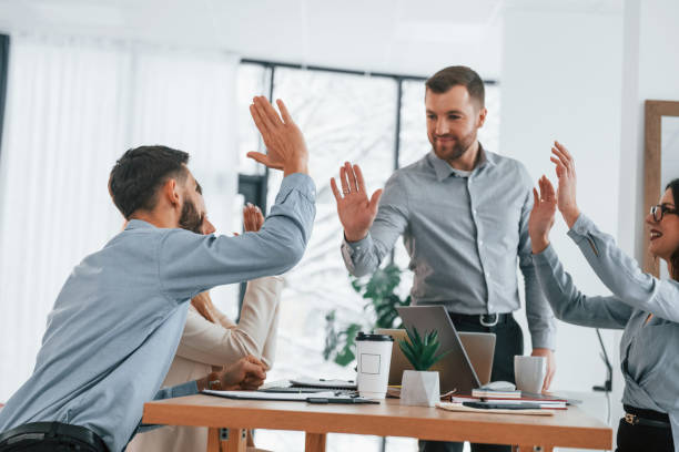 istock Using brainstorming technique. Group of business people that working on the project in the office 1371099797