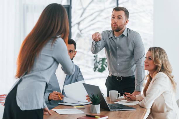 istock Active conversation. Group of business people that working on the project in the office 1371099798