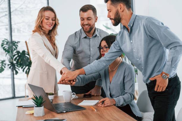 istock Internet connection by using laptop. Group of business people that working on the project in the office 1371101311