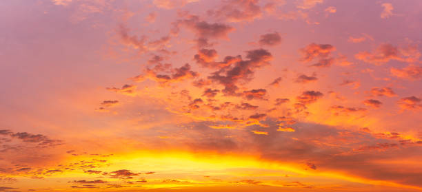 istock Colorful golden hour sky and softness clouds and glowing sunlight, panoramic nature background 1371101607