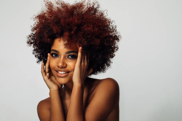 istock Beautiful afro woman with perfect make-up 1371102103