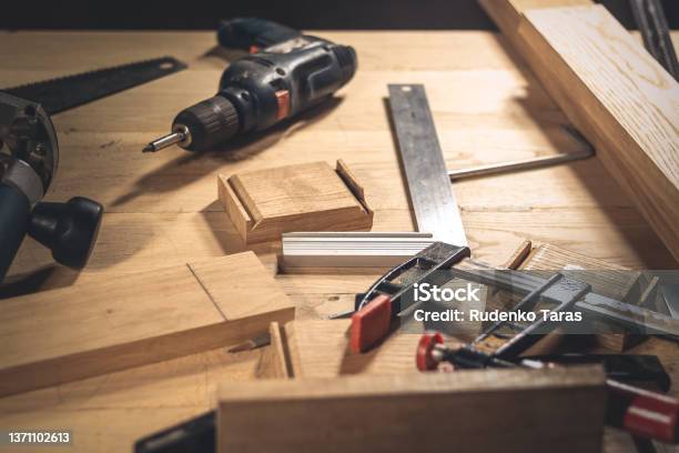 Different Construction Tools With Hand Tools For Home Renovation On Wooden Board Maintenance And Reparing Concept Stock Photo - Download Image Now