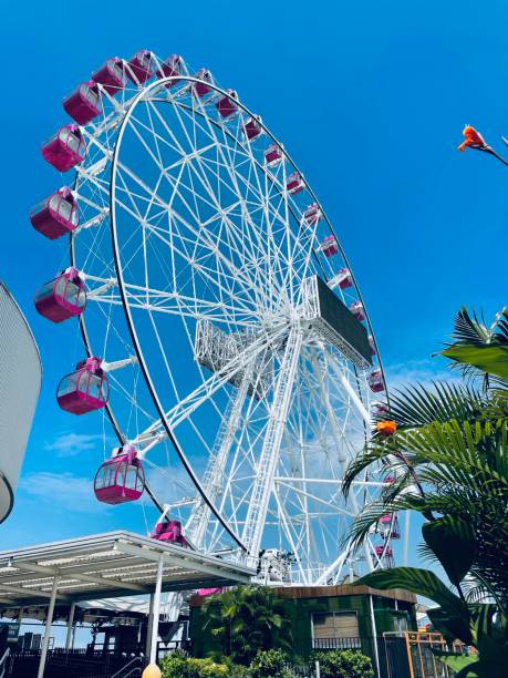 istock Ferris wheel and sunny Day 1371105374
