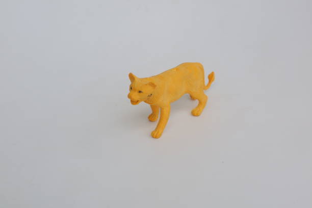 istock lioness shaped toy made of plastic 1371107475