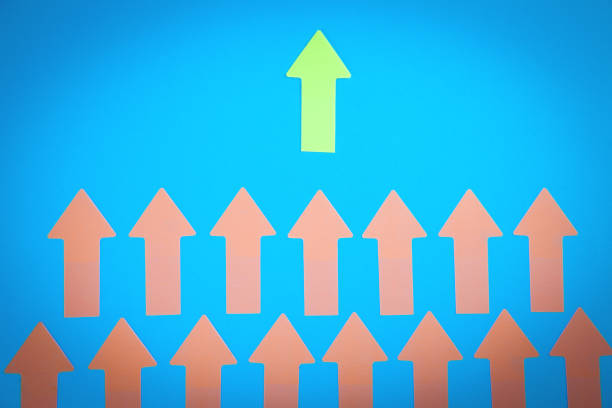 istock Leader arrow leading team. Leadership 1371107952