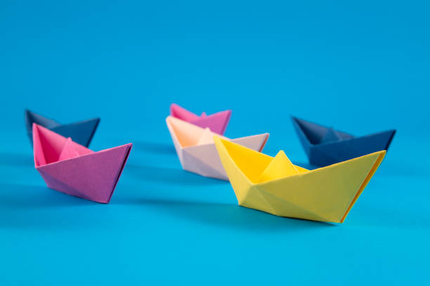 istock Leadership Concept with Paper Boats 1371110155