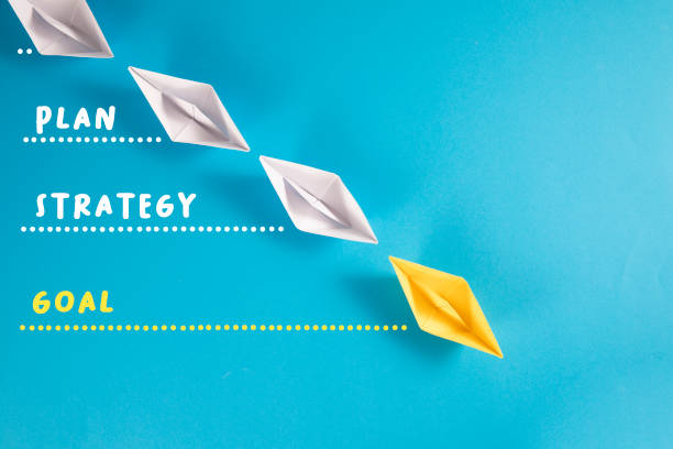 istock Leadership Concept with Paper Boats 1371110318