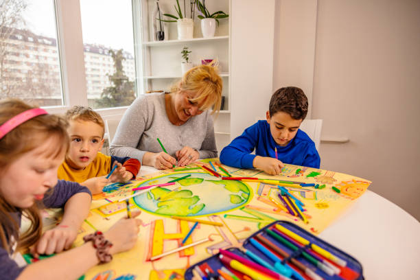 istock Creative mother, using art to teach her children about sustainability 1371111062