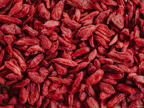 Goji berries dried close up full frame background