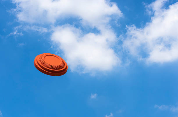 istock Clay disc target shooting on the blue sky , Clay pigeon targets game 1371118125