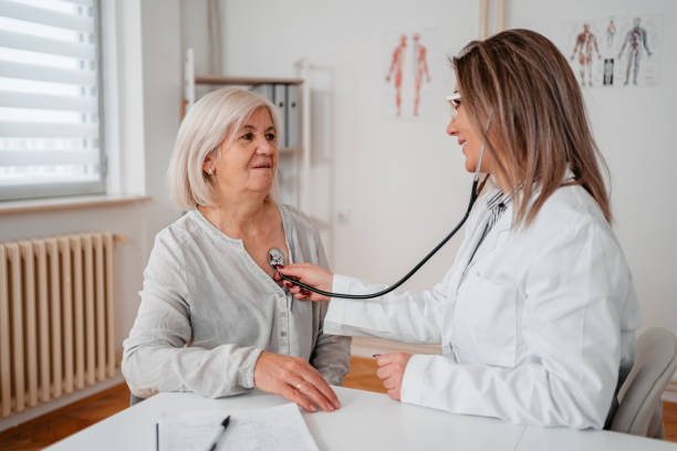 istock Doctor Auscultating A Senior Patient 1371119376