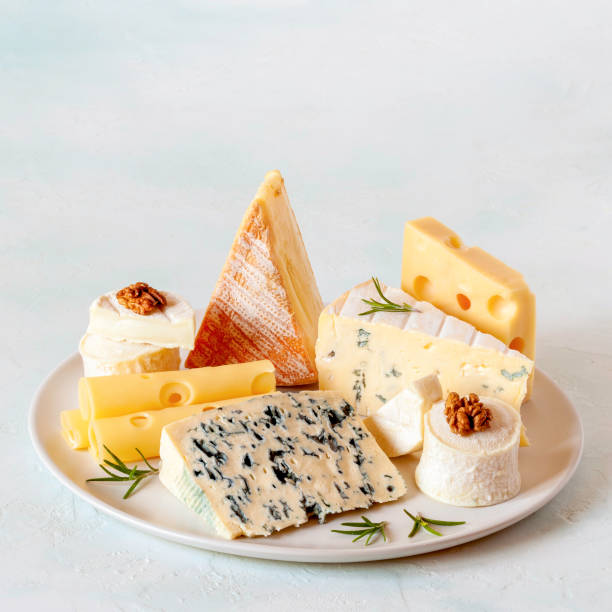 istock Cheese plate with different types of french cheese 1371119884