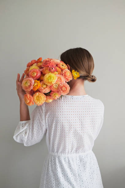 istock Woman with beautiful bouquet. 1371121041
