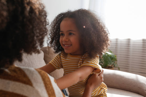 istock Older sister baby sits the younger one. 1371123019