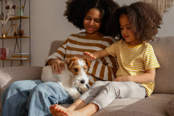 istock Older sister baby sits the younger one. 1371123503