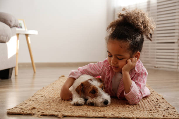 Little girl and her four pawed friend.