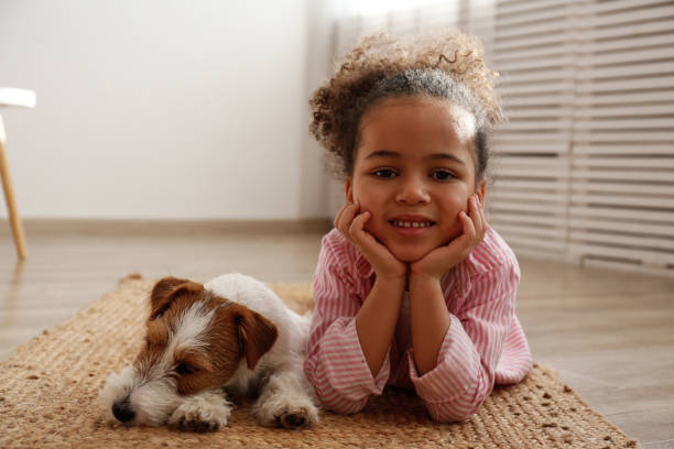 istock Little girl and her four pawed friend. 1371123745