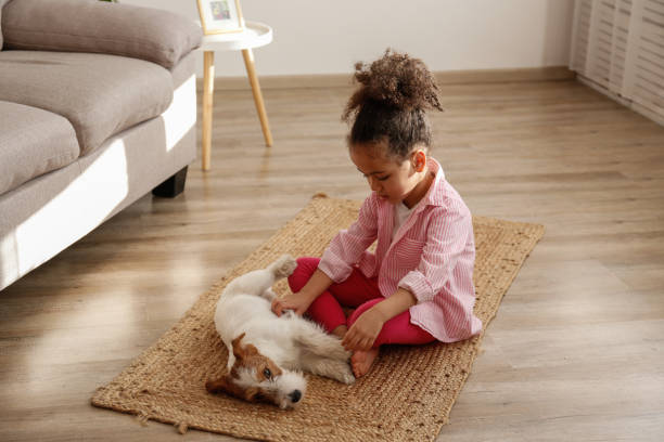 istock Little girl and her four pawed friend. 1371123780