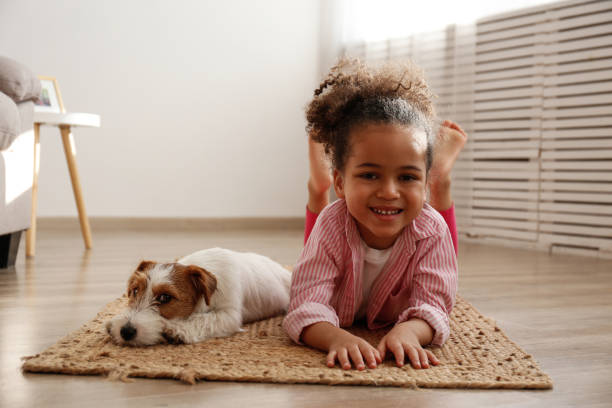 istock Little girl and her four pawed friend. 1371123782