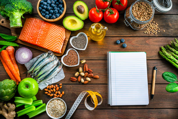 istock Heart care: food rich in Omega-3 and note pad 1371124552