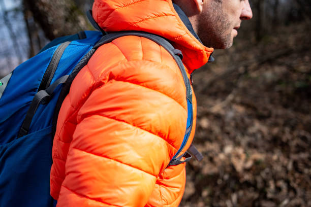 istock Hiker-man hiking in forest 1371126242