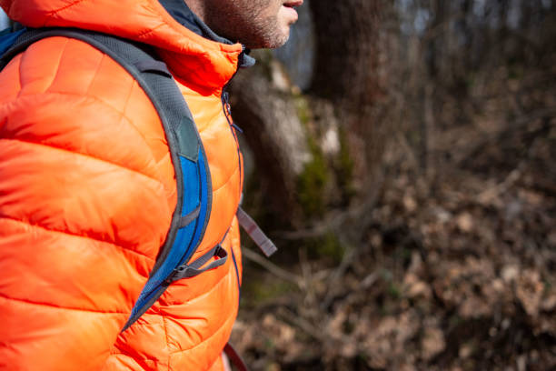 istock Hiker-man hiking in forest 1371126532