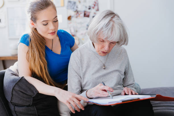 istock Daughter assisting mother with paperwork￼ 1371126584