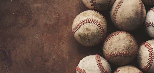 istock Old nostalgia baseball background with vintage balls. 1371127789