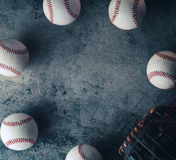 istock Baseball balls in circle with glove. 1371129707