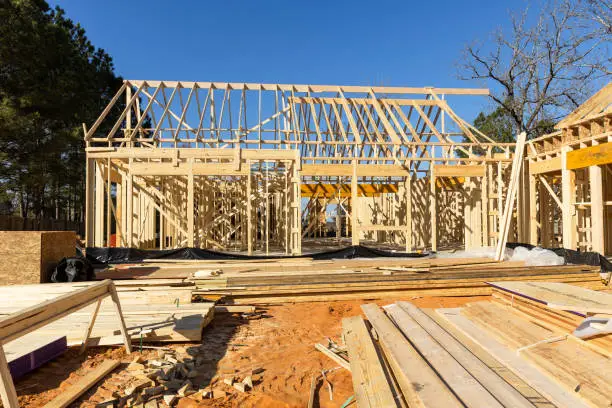 Photo of New home under construction during the framing process