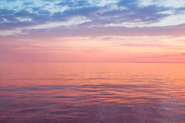 Lilac seascape with clouds
