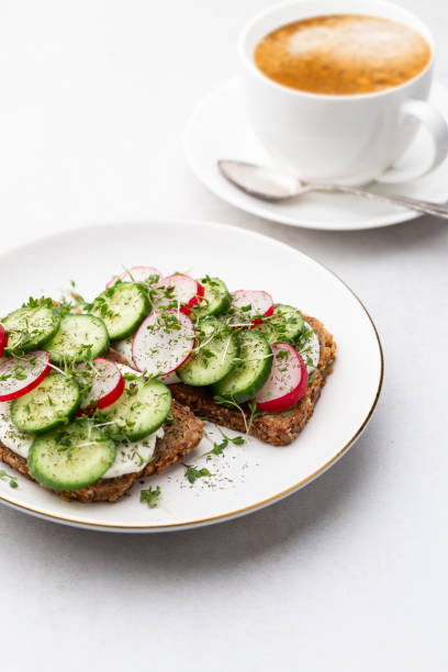 istock Keto Toasts with cucumber, egg, mozzarella and microgreens. 1371131174
